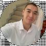 Алишер Токишев