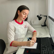 Катерина Левицька, масажист, дієтолог, обгортання фото