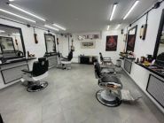 The One, чоловіча перукарня фото