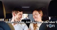 Uber таксі фото