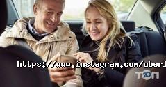 Uber таксі фото