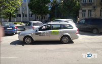 Opti Taxi, служба такси фото