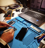Максі сервіс, ремонт мобільних телефонів фото