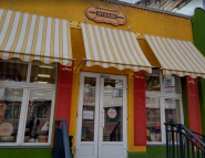 Маленька Італія, магазин делікатесів фото