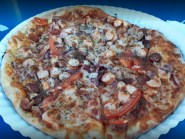 Pizza на дровах, доставка піци фото