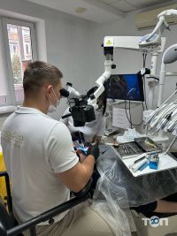 компанія CosmoDent фото