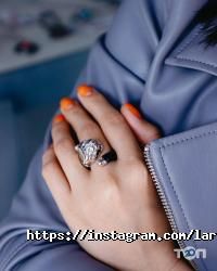 Магазины одежды и обуви Larimar jewelry фото