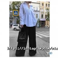 Магазини одягу та взуття Status фото