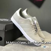 Магазини одягу та взуття Cross Centre фото