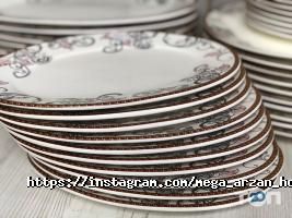Магазины одежды и обуви Mega Arzan фото