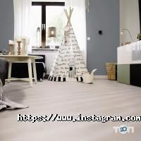 Хата ламината, магазин напольных покрытий фото