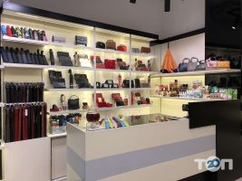 Магазини одягу та взуття Prego фото