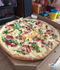 Доставка піци, суші та обідів Експрес Піца фото