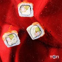 Доставка піци, суші та обідів De'Sushi фото
