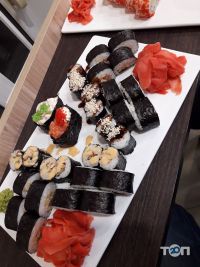 Доставка піци, суші та обідів Sushi Club фото
