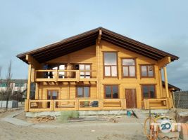 Дерев'яні конструкції Будівництво дерев'яних будинків фото