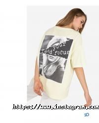 Магазини одягу та взуття Глорія Джинс фото