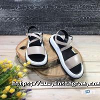 Mida, мережа взуттєвих магазинів фото