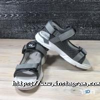 Магазини одягу та взуття Mida фото