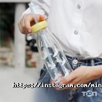 Магазини одягу та взуття Miniso фото