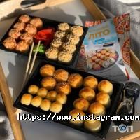 Доставка піци, суші та обідів Суши Wok фото