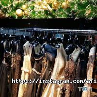 Магазини одягу та взуття Afina luxury фото