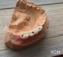 Стоматолог Смутний Олег відгуки фото