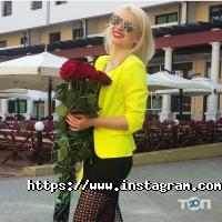 Магазини квітів World of flowers фото