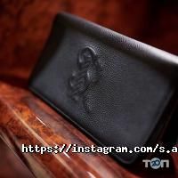 Магазини одягу та взуття Savoy фото