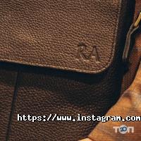 Магазини одягу та взуття Ra фото