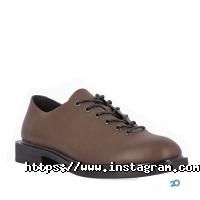 Магазини одягу та взуття Luciano Carvari фото