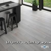 Магазини паркету та ламінату Паркетник фото