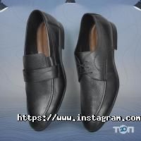 MІDA, магазин взуття фото