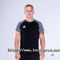 Спортивний одяг та інвентар Peak фото