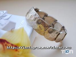 Магазини одягу та взуття Sincera фото