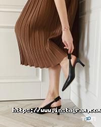 Магазини одягу та взуття Євротоп фото