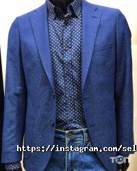 Магазини одягу та взуття Selection фото