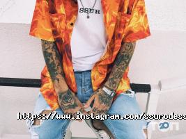 Магазини одягу та взуття Ssur фото