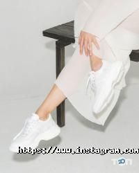 Магазини одягу та взуття Giardini фото