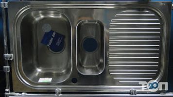 Магазини сантехніки та кераміки Мойдодир фото