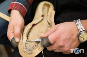 Ремонт взуття Timotheus фото