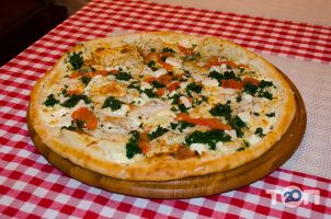 Доставка піци, суші та обідів Мілано фото