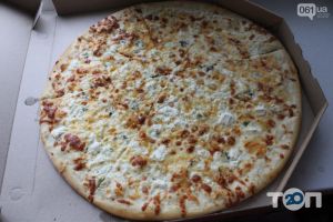 Доставка піци, суші та обідів Pizza Hosse фото