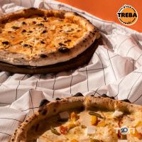 Доставка піци, суші та обідів Treba Pizza фото
