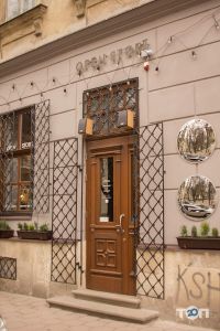 Магазини одягу та взуття Open Store фото