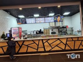 Доставка піци, суші та обідів Гастро фото