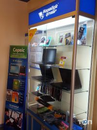 Ремонт комп'ютерів та офісної техніки Notebook Center фото