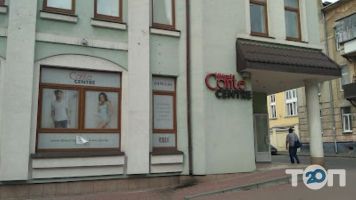 Магазини одягу та взуття Conte Centre фото
