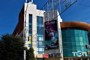 Торгові, торгово-розважальні центри ТЦ Жовтень фото