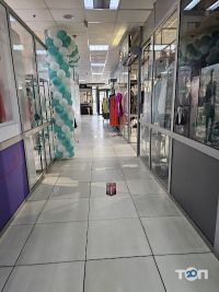 Жовтень, торговий центр фото